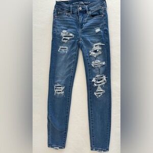 AE NEXT LEVEL PATCHED HIGH WAISTED JEGGING. SIZE: 00 SHORT